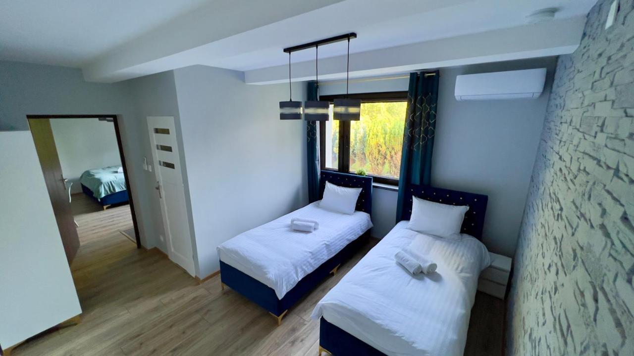 Aparthotel W Dolinie Stawow Zator By Housine Las Exterior photo
